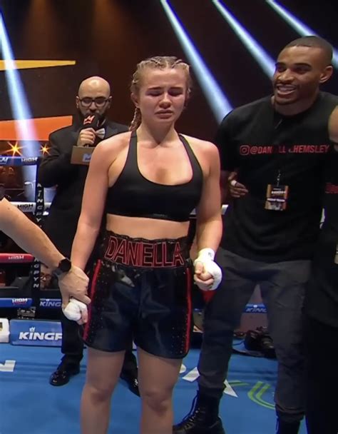 boxer flashes audience|Boxer Daniella Hemsley celebrates win by flashing crowd